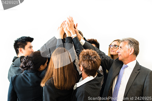 Image of Teamwork - business people with joint hands