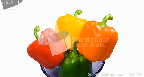 Image of Four peppers in a bowl