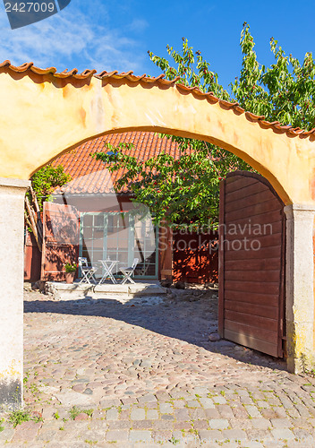 Image of Colorful patio in a Swedish town Visby