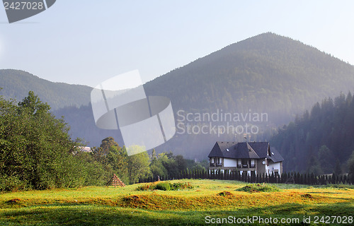Image of House among mountains