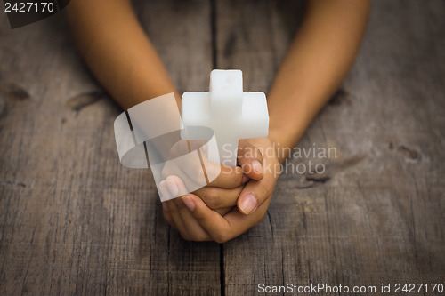 Image of Holding a Religious Cross