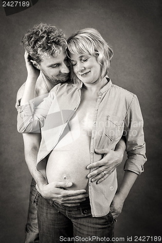 Image of Loving happy couple, pregnant woman with her husband