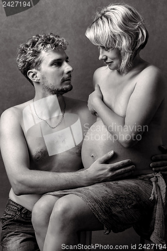 Image of Loving happy couple, pregnant woman with her husband