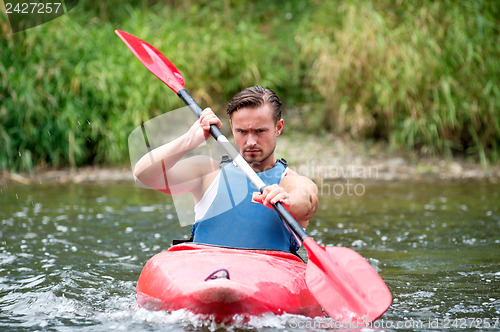 Image of Man kayaking