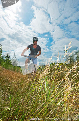 Image of Man on bike