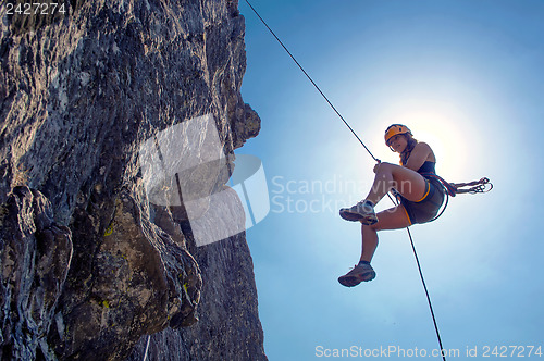 Image of Abseiling woman