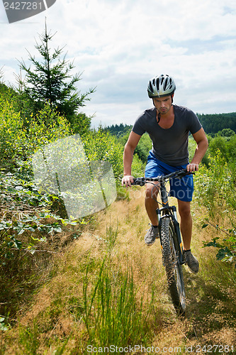 Image of Man on bike