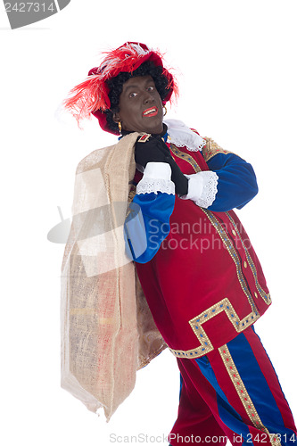 Image of Zwarte Piet with a bag full of presents