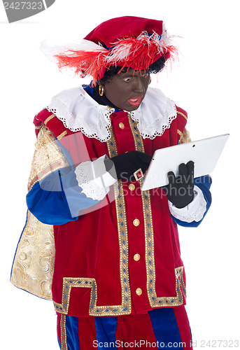 Image of Zwarte Piet with a tablet