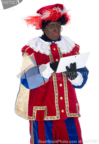Image of Zwarte Piet with a tablet