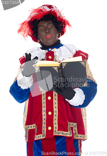Image of Zwarte Piet and the book of Sinterklaas