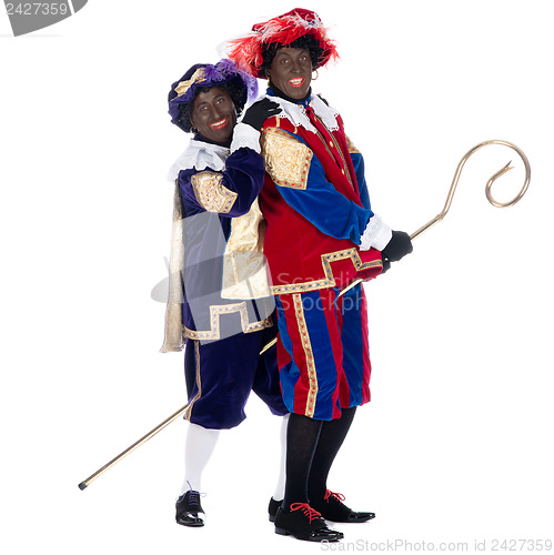 Image of Zwarte Piet and the staff of Sinterklaas