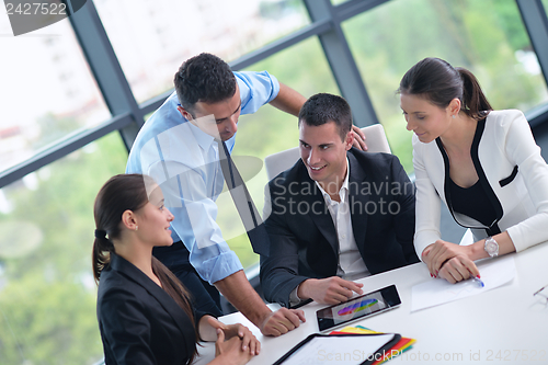 Image of business people in a meeting at office