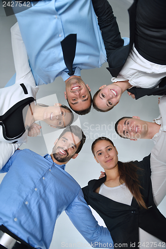 Image of business people group joining hands