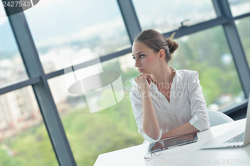 Image of business woman at  office