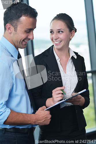 Image of business people in a meeting at office