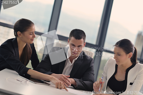 Image of business people in a meeting at office