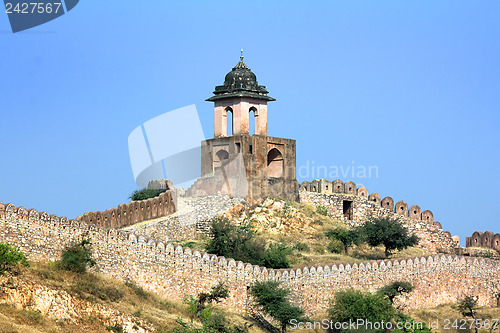 Image of fortification on top of mountain - Jaipur India