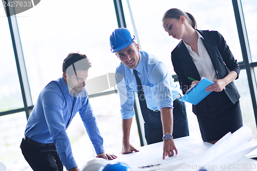 Image of business people and engineers on meeting