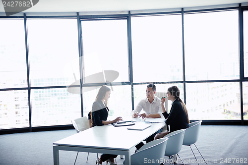 Image of business people in a meeting at office