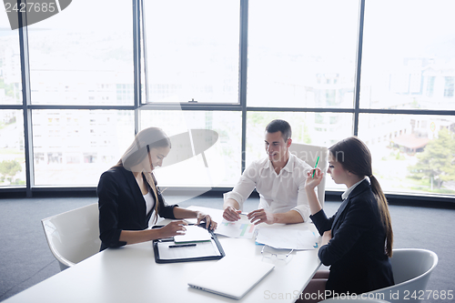 Image of business people in a meeting at office