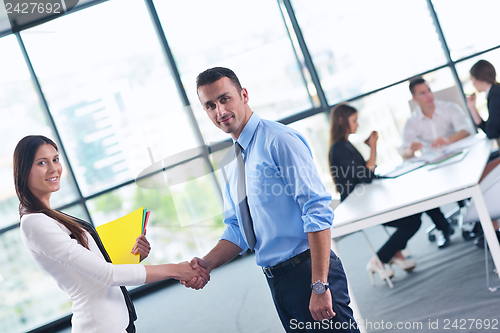 Image of business people making deal