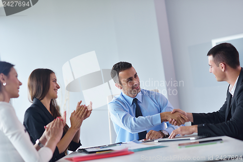 Image of business people in a meeting at office