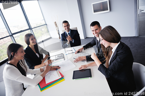 Image of business people in a meeting at office
