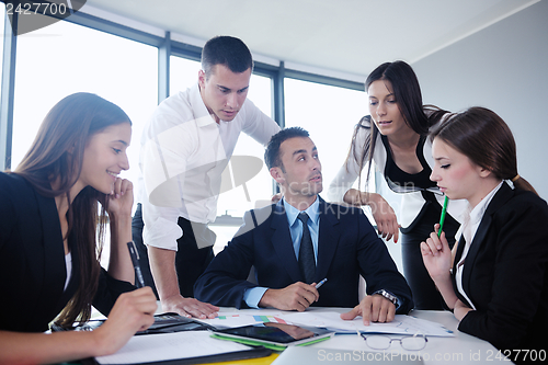 Image of business people in a meeting at office