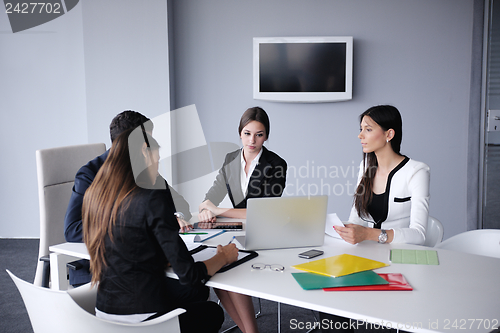 Image of business people in a meeting at office