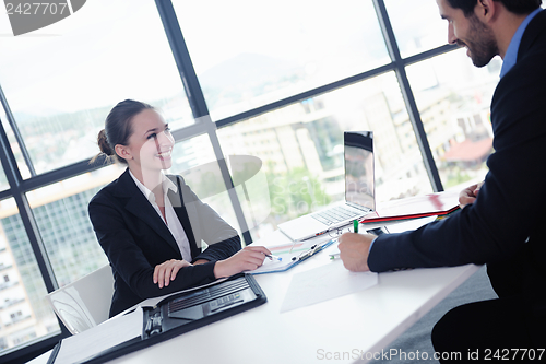 Image of business people in a meeting at office