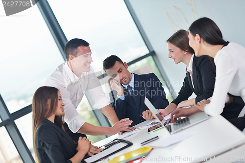 Image of business people in a meeting at office