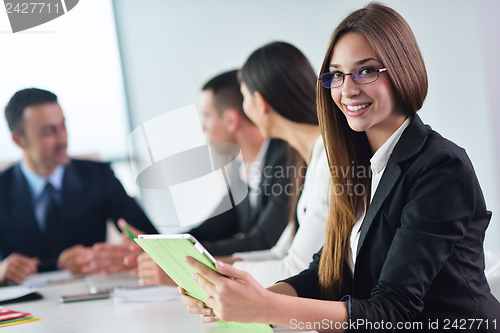 Image of business people in a meeting at office