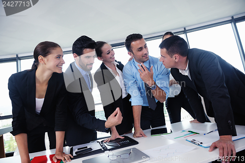 Image of business people in a meeting at office