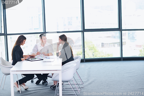 Image of business people in a meeting at office