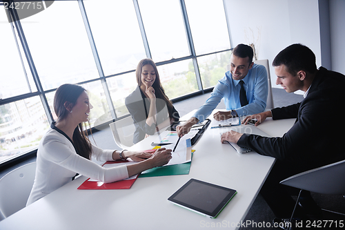 Image of business people in a meeting at office