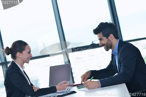 Image of business people in a meeting at office