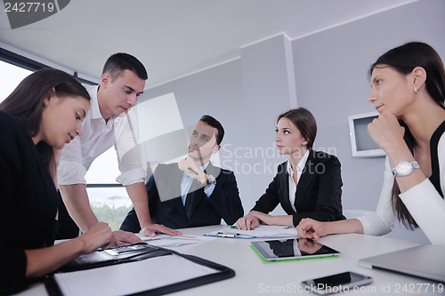 Image of business people in a meeting at office