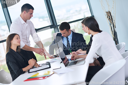 Image of business people in a meeting at office