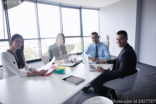 Image of business people in a meeting at office