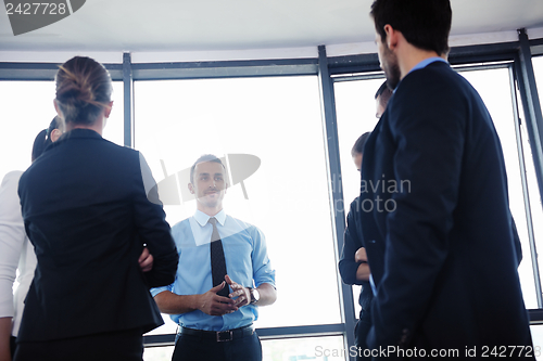 Image of business people in a meeting at office