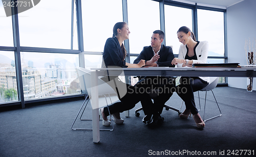 Image of business people in a meeting at office