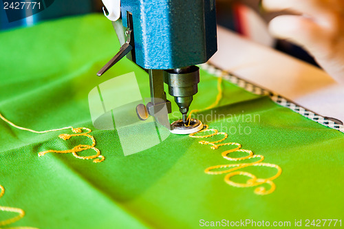 Image of Lady hand at sewing