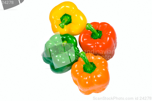 Image of Four wet peppers top view