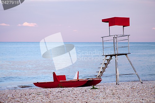 Image of abandoned lifeguard tower and boat