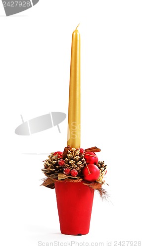 Image of Christmas decor with gold candle