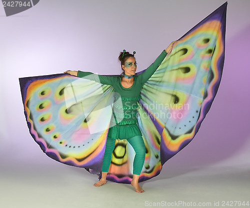 Image of dancing butterfly woman