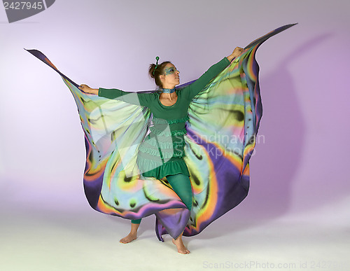 Image of dancing butterfly woman