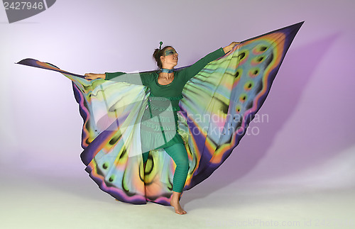 Image of dancing butterfly woman