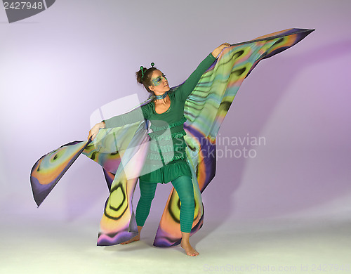 Image of dancing butterfly woman